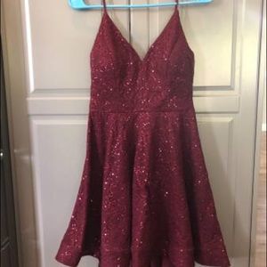 Knee length burgundy/maroon dress. Size 7 women’s.